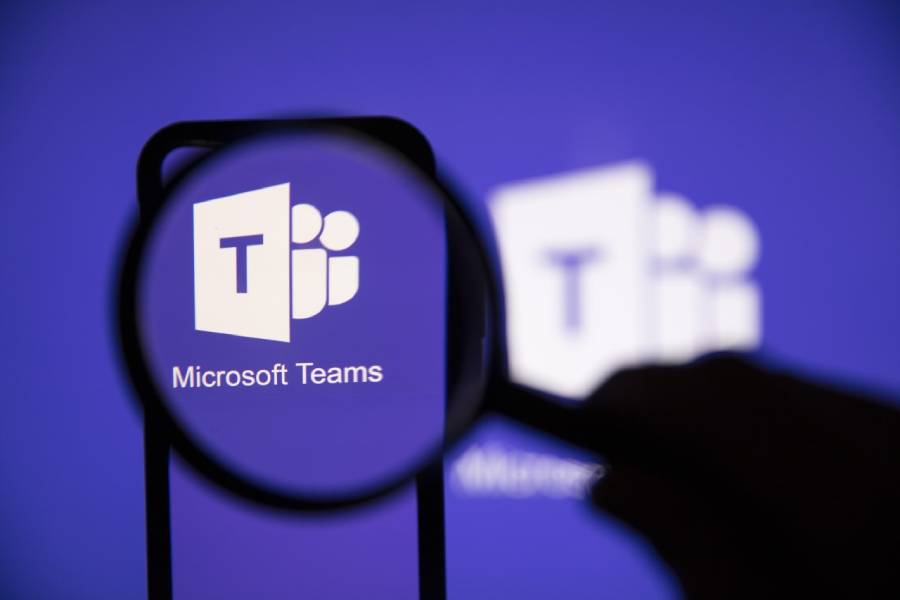 Microsoft Teams logo under a magnifying glass