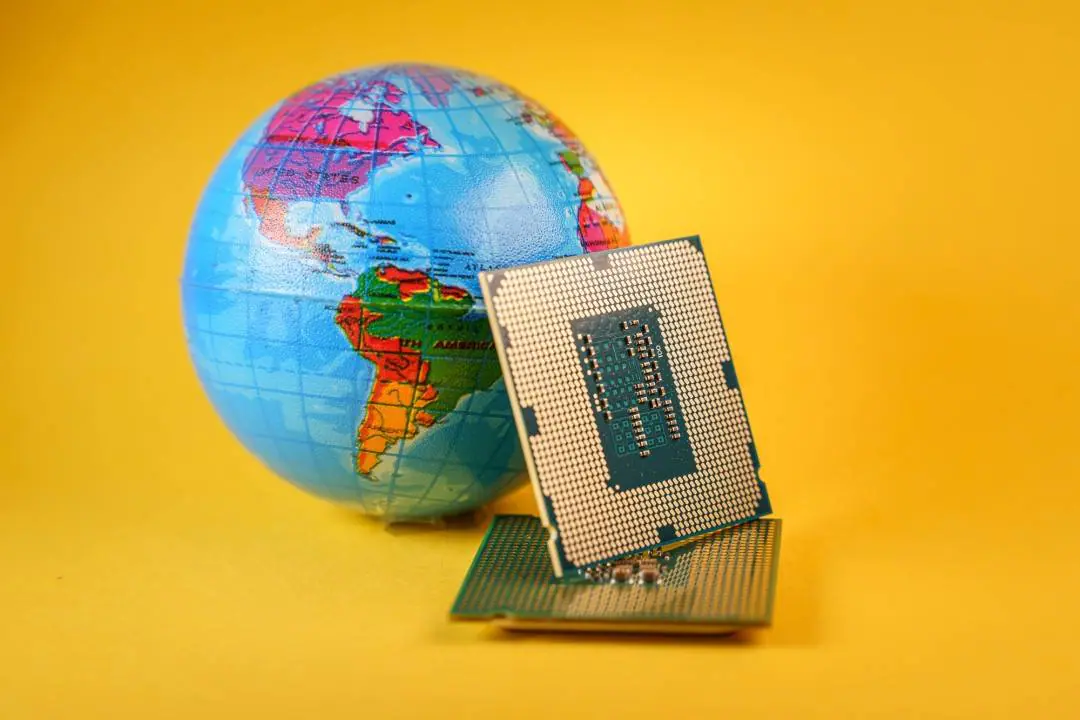 Computer chips next to a globe