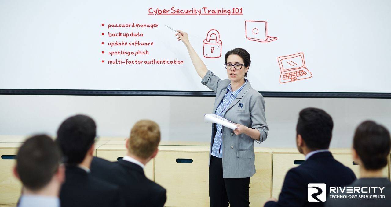 Person giving a cybersecurity training lecture in front of a crowd