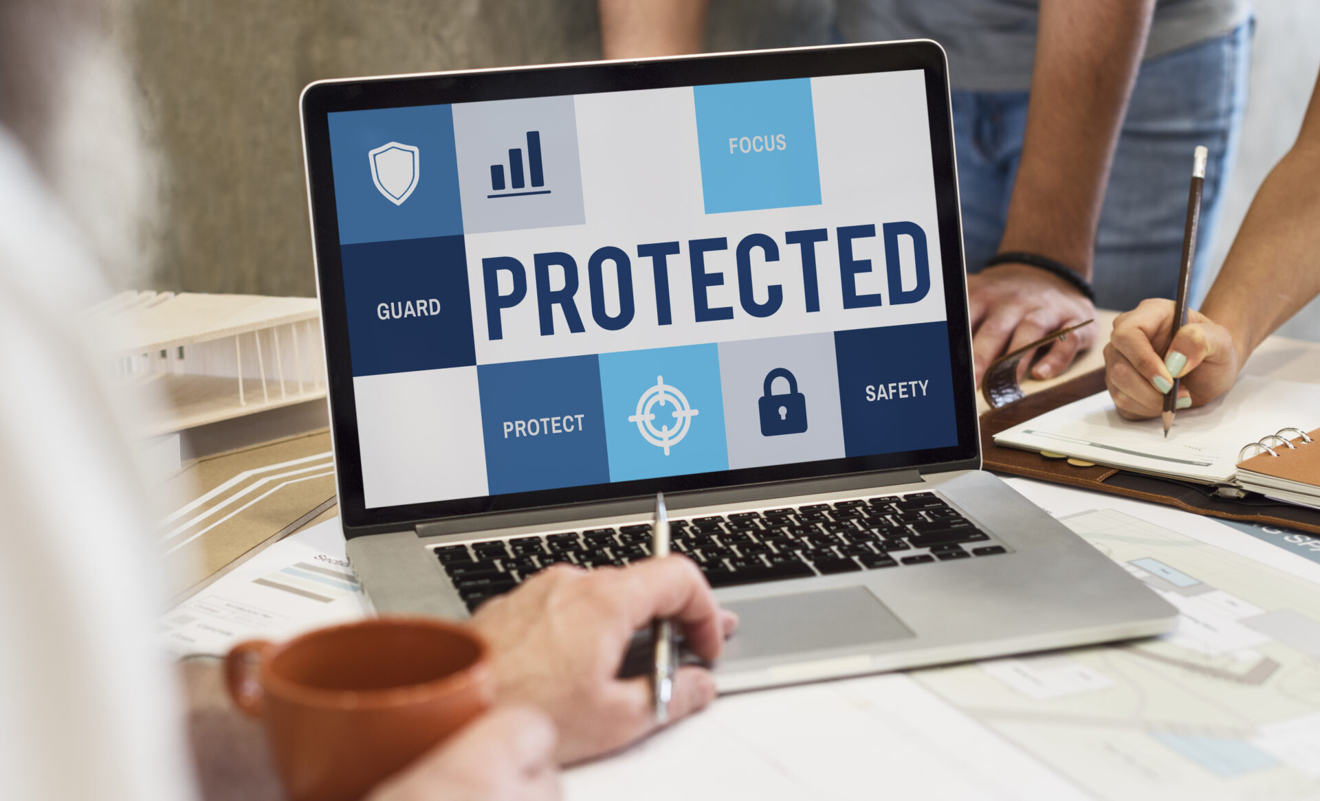 Laptop with the word Protected on it.